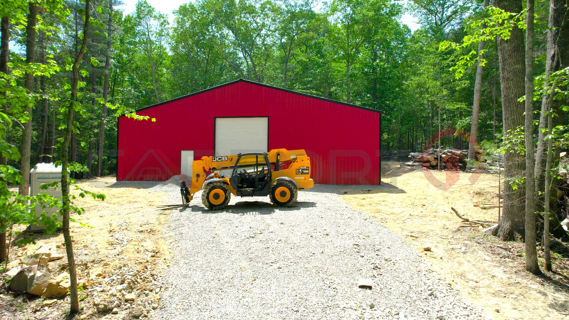 Commercial barn with heavy equipment