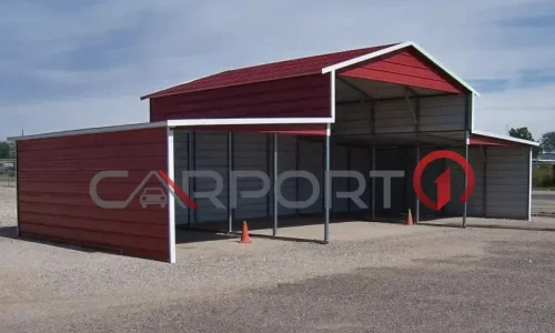 a red metal building with a roof
